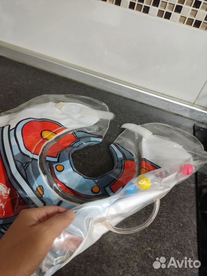 Круг для плавания с погремушкой