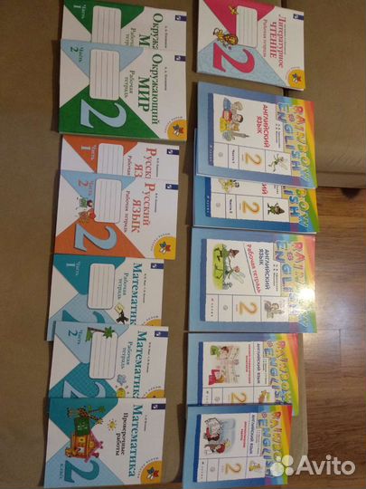 Рабочие тетради и учебники.