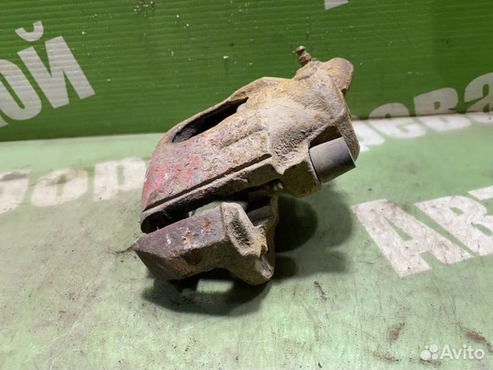 Суппорт тормозной передний правый Kia Shuma