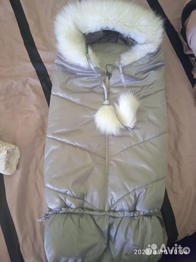 Конверт и комбинезон новорожденного