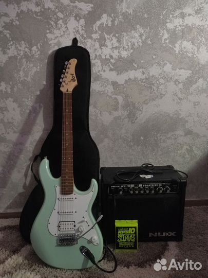 Электрогитара и комбоусилитель