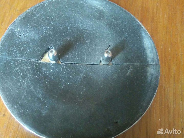 Шильдик -эмблема на Сан Йонг