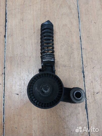 Натяжной ролик приводного ремня Opel Astra H