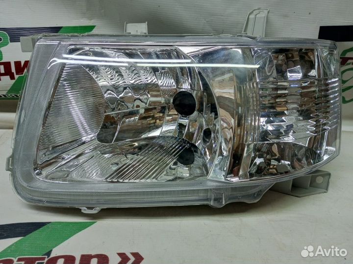 Фара toyota probox 02-14 LH