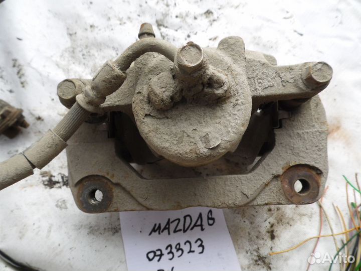 Суппорт тормозной передний левый Mazda Mazda 6 (GH