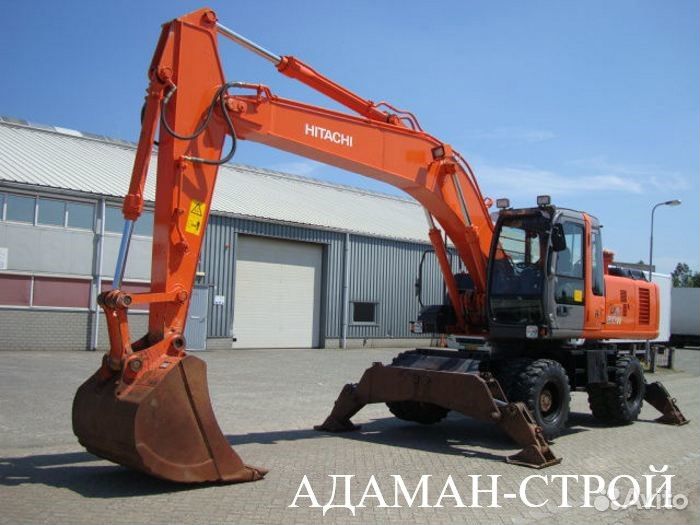 Машинист колесного экскаватора