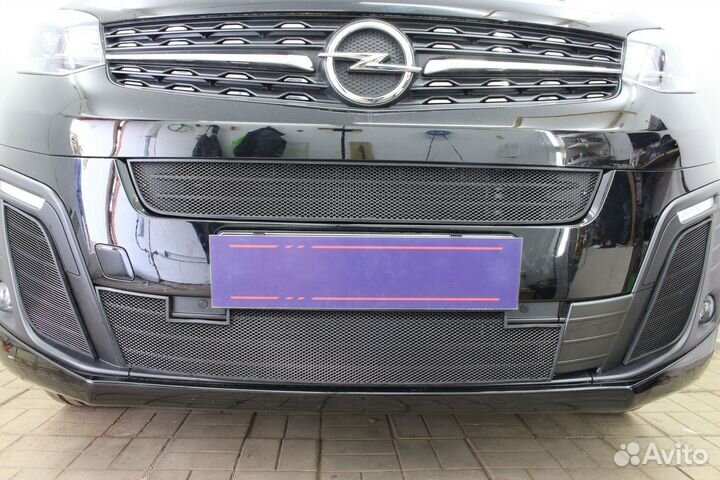 Защитная сетка радиатора боковые черная Opel Zafir