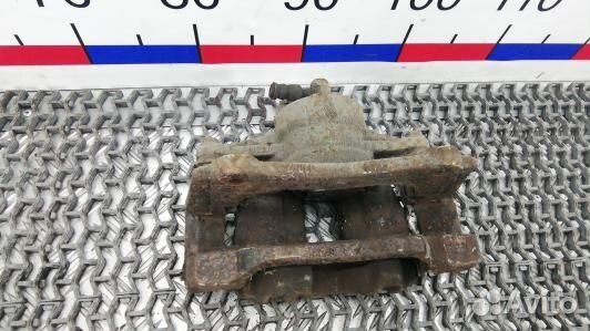 Суппорт тормозной передний левый toyota corolla ve