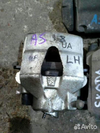 Суппорт передний левый VAG Skoda Volkswagen