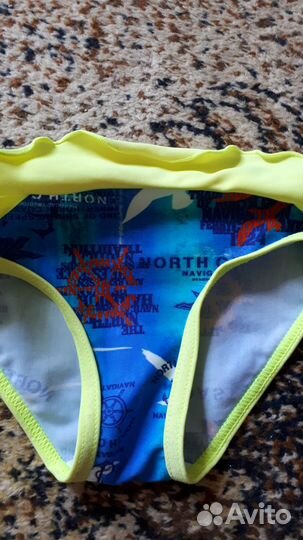 Купальные плавки и сабо для девочки