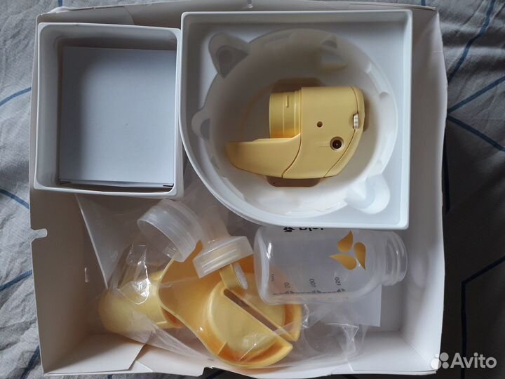 Молокоотсос medela электрический