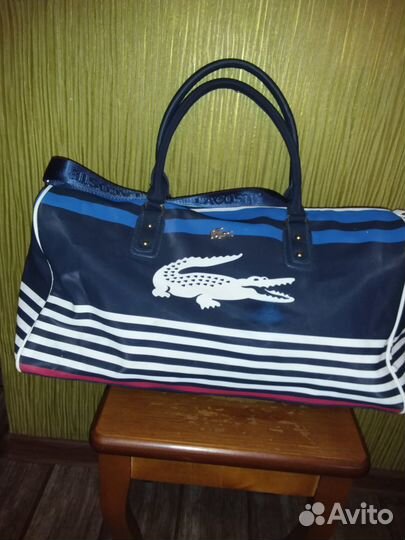 Спортивная сумка lacoste размеры: 23*49*29