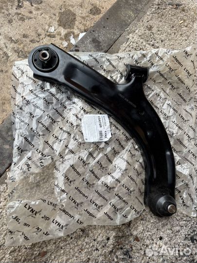 Рычаг Nissan tiida