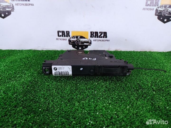 Замок крышки багажника