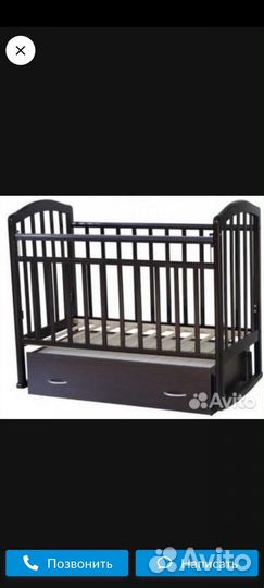 Детская кроватка с маятником