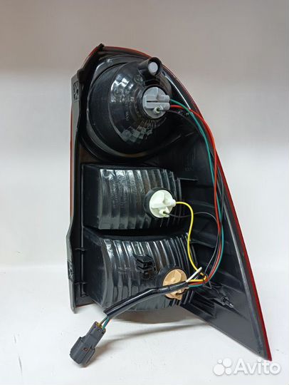 Фонарь левый Ssangyong Actyon Sports 1