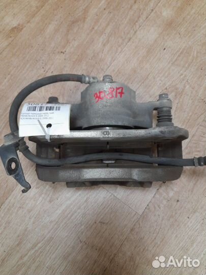 Суппорт тормозной передний правый Honda Accord 8