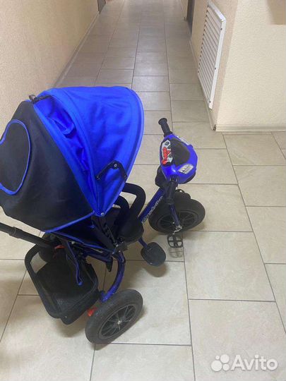 Трехколесный велосипед с ручкой