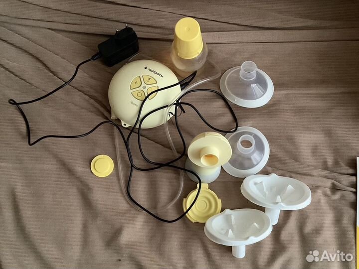 Молокоотсос medela swing flex