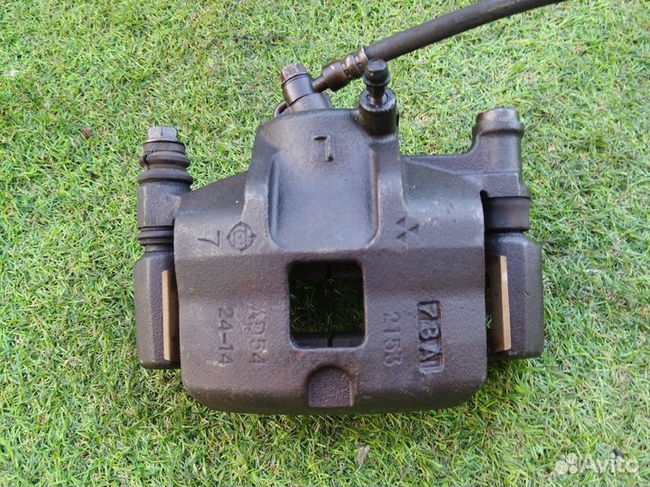 Суппорт передний левый Mazda 626 GD