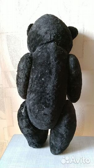 Медведь плюшевый