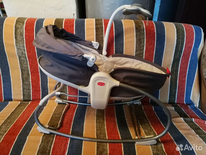 Люльку баунсер tiny love