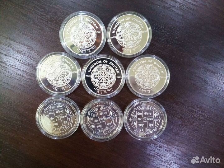 Серебряные монеты к олимпиаде. Бутан и Непал