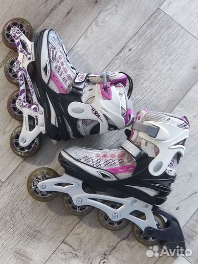 Роликовые коньки