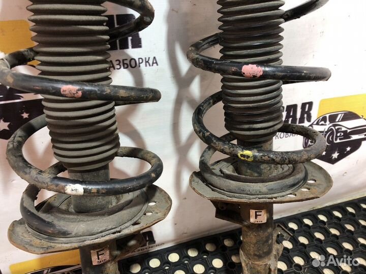 Стойки амортизаторов передние (комплект)