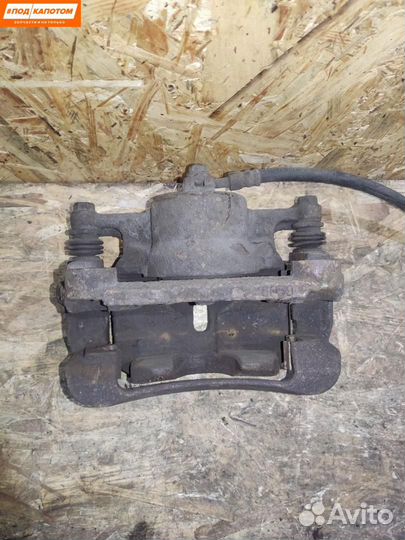 Суппорт тормозной передний правый Nissan X-Trail