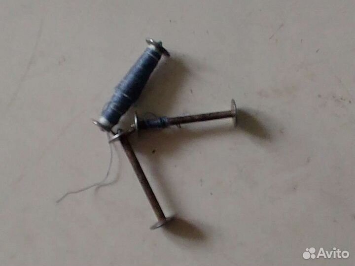 Шпуля для швейной машины Зингер