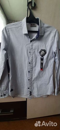 Рубашки на мальчика 134 140