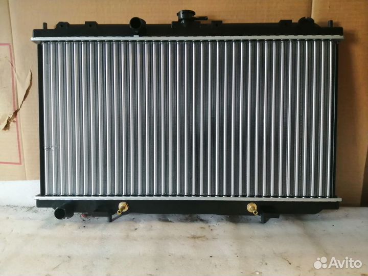 Радиатор двс almera primera сборка Великобритания