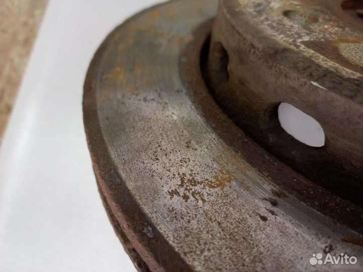 Тормозной диск передний Kia Spectra седан S6D 1.6