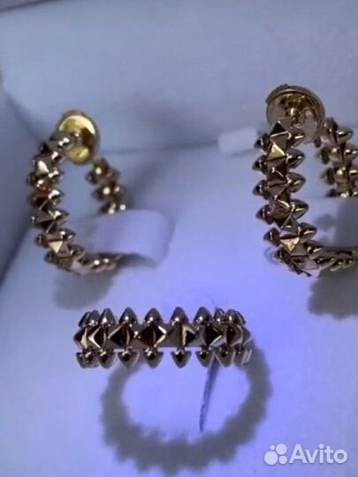 Золото, кольцо и серьги Clash de Cartier