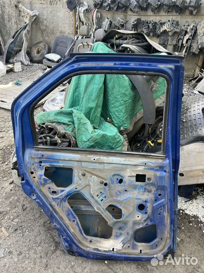 Дверь задняя левая Renault Логан 1