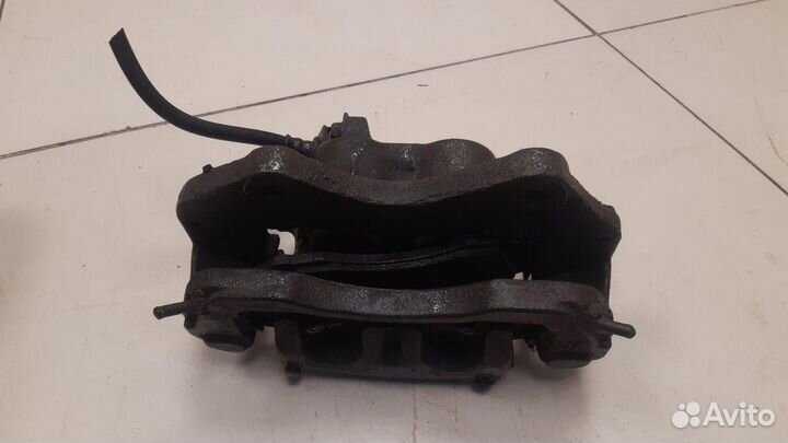 Суппорт передний левый Mitsubishi Pajero Sport