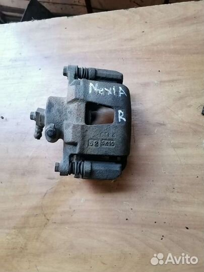 Суппорт тормозной передний правый Daewoo Nexia