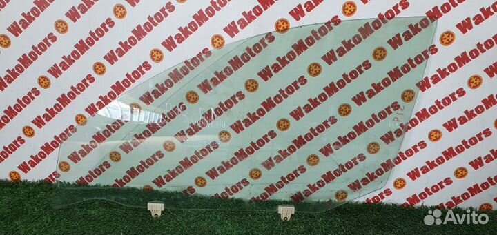 Стекло двери переднее левое Nissan Primera TP12