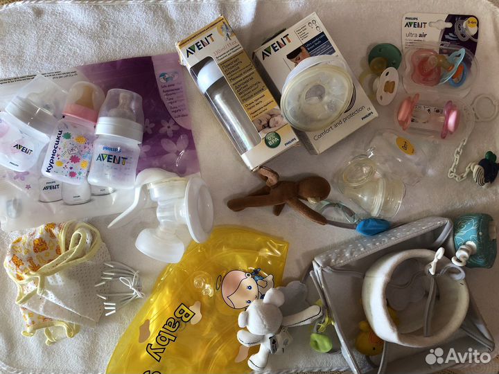 Молокоотсос ручной и др. товары для младенцев