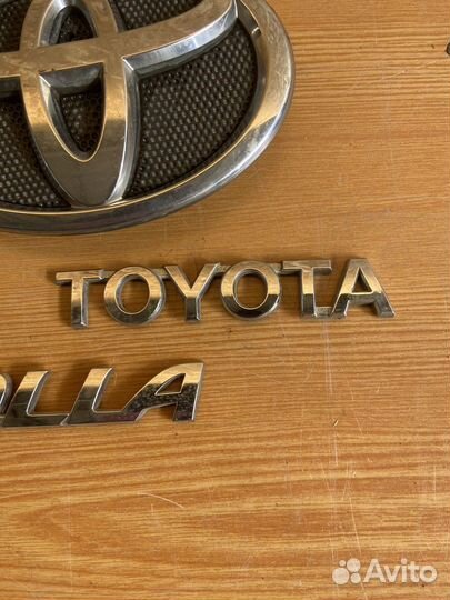 Эмблема решетки toyota corolla E150