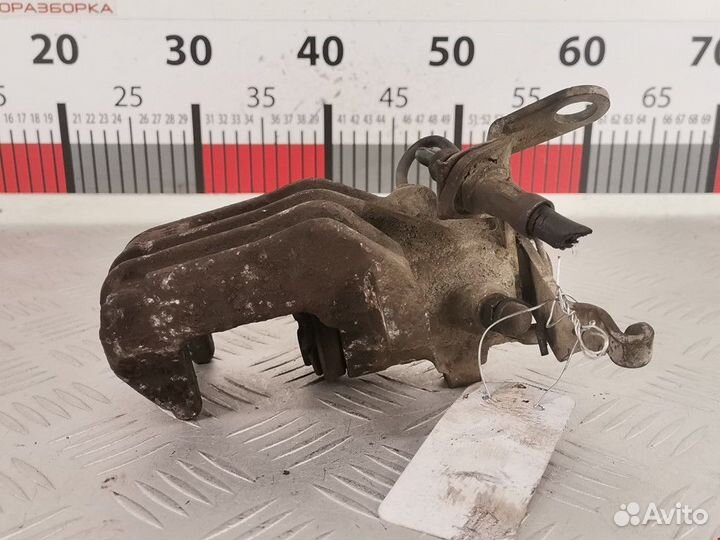 Суппорт задний левый seat Altea 2004 1K0615423J