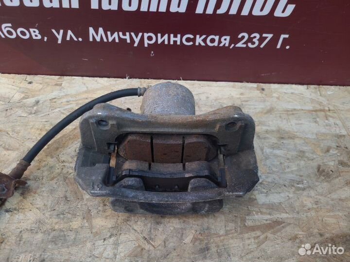 Суппорт тормозной передний левый Kia Ceed JD