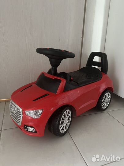 Детская машинка каталка с музыкой