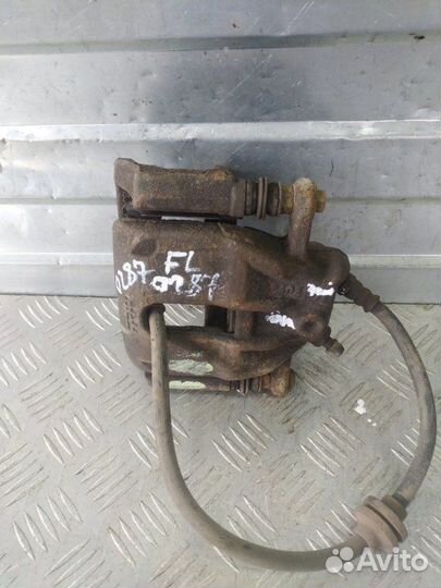 Суппорт тормозной передний левый Renault Duster