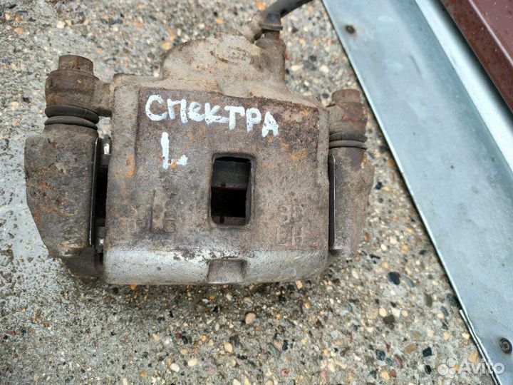 Суппорт тормозной передний левый Kia Spectra S6D