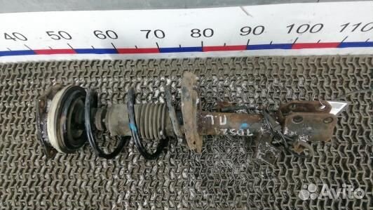 Стойка передняя левая nissan note E11 (1BS21K501)