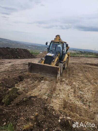 Экскаватор погрузчик