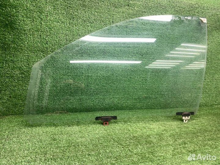 Стекло двери переднее левое Toyota Yaris