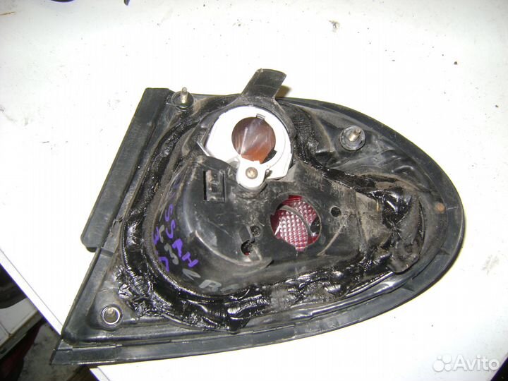 Фонарь внешний левый Nissan Almera N15